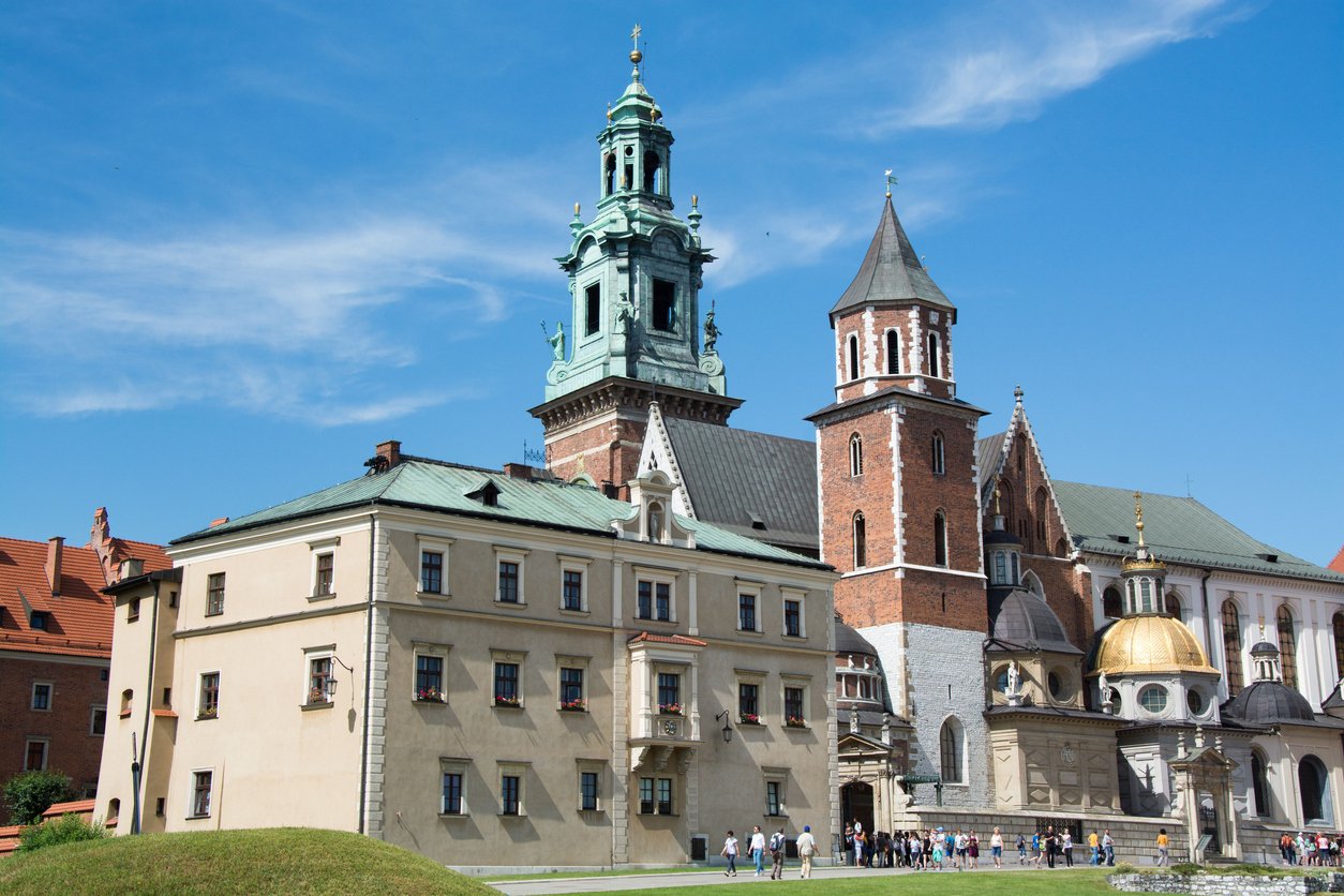 Wawel Cathedral with a cloudy blue sky in the background in Krakow, Poland