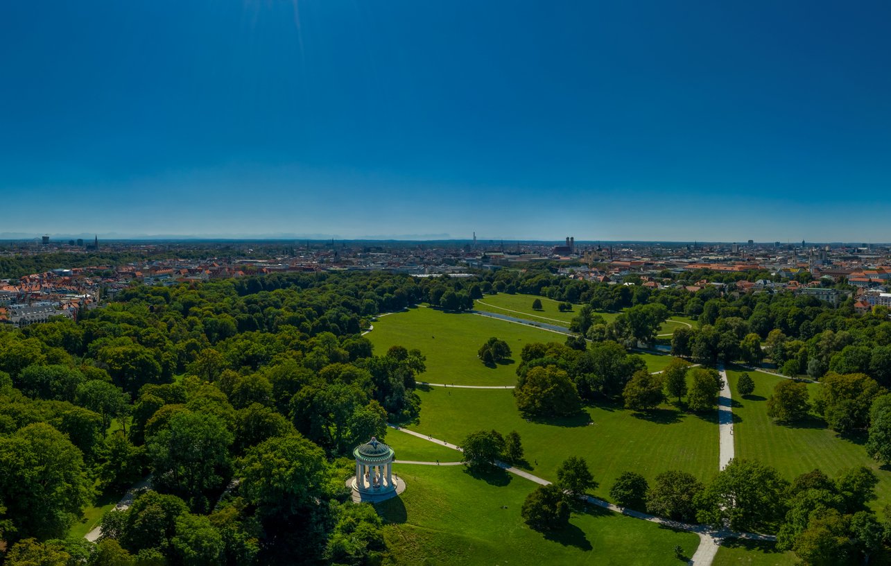 Munich from Above with panoramic copy space, English Garden in Springtime