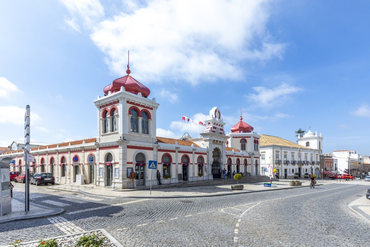 Moorish architectural facade of the traditional market consisting of family run stalls selling local grown or sourced produce which include fish, fabrics and gifts