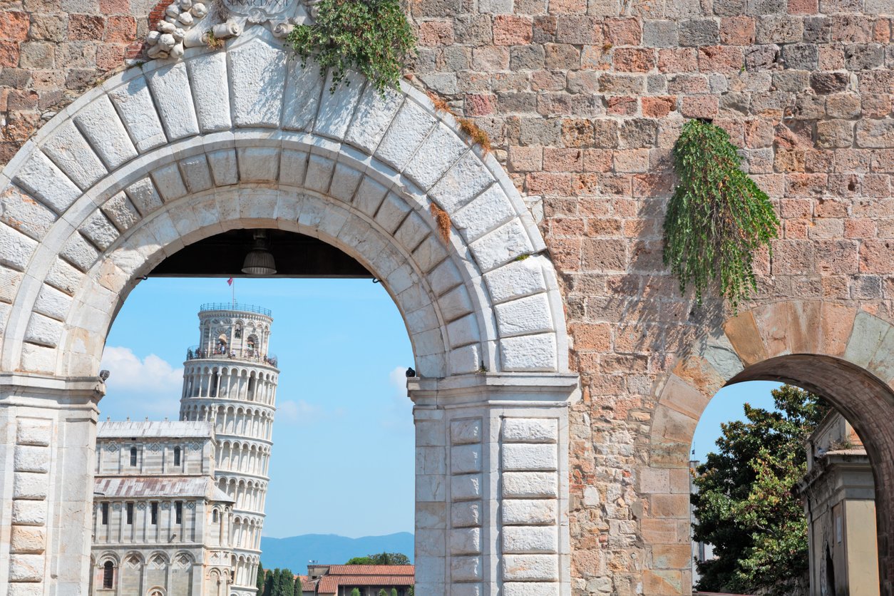 Tower of Pisa through main entrance to town