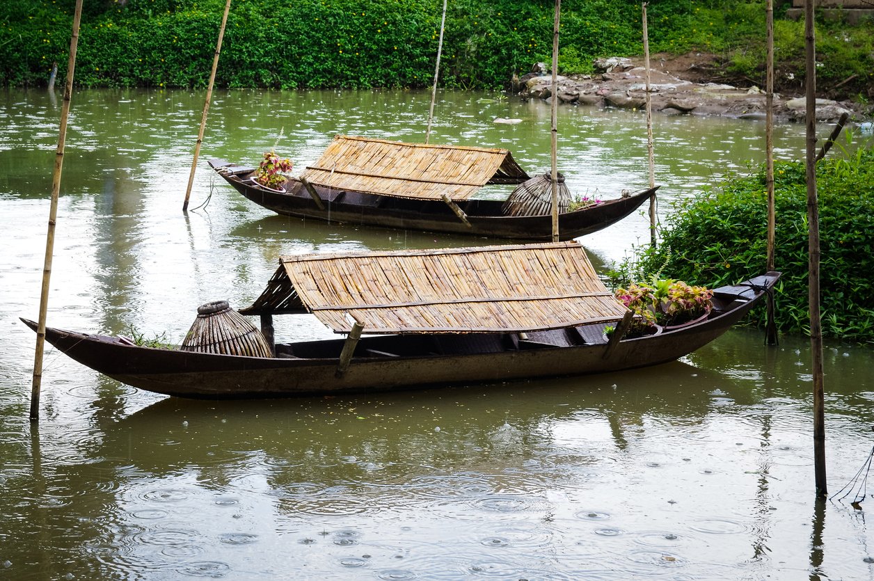 Couple of boats in rainy day