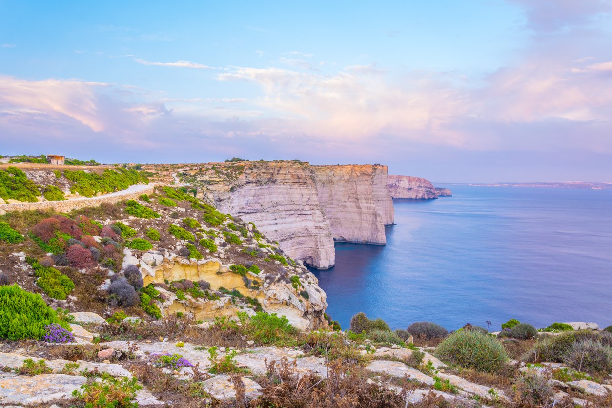 Sunset view over Ta Cenc cliffs on Gozo, Malta