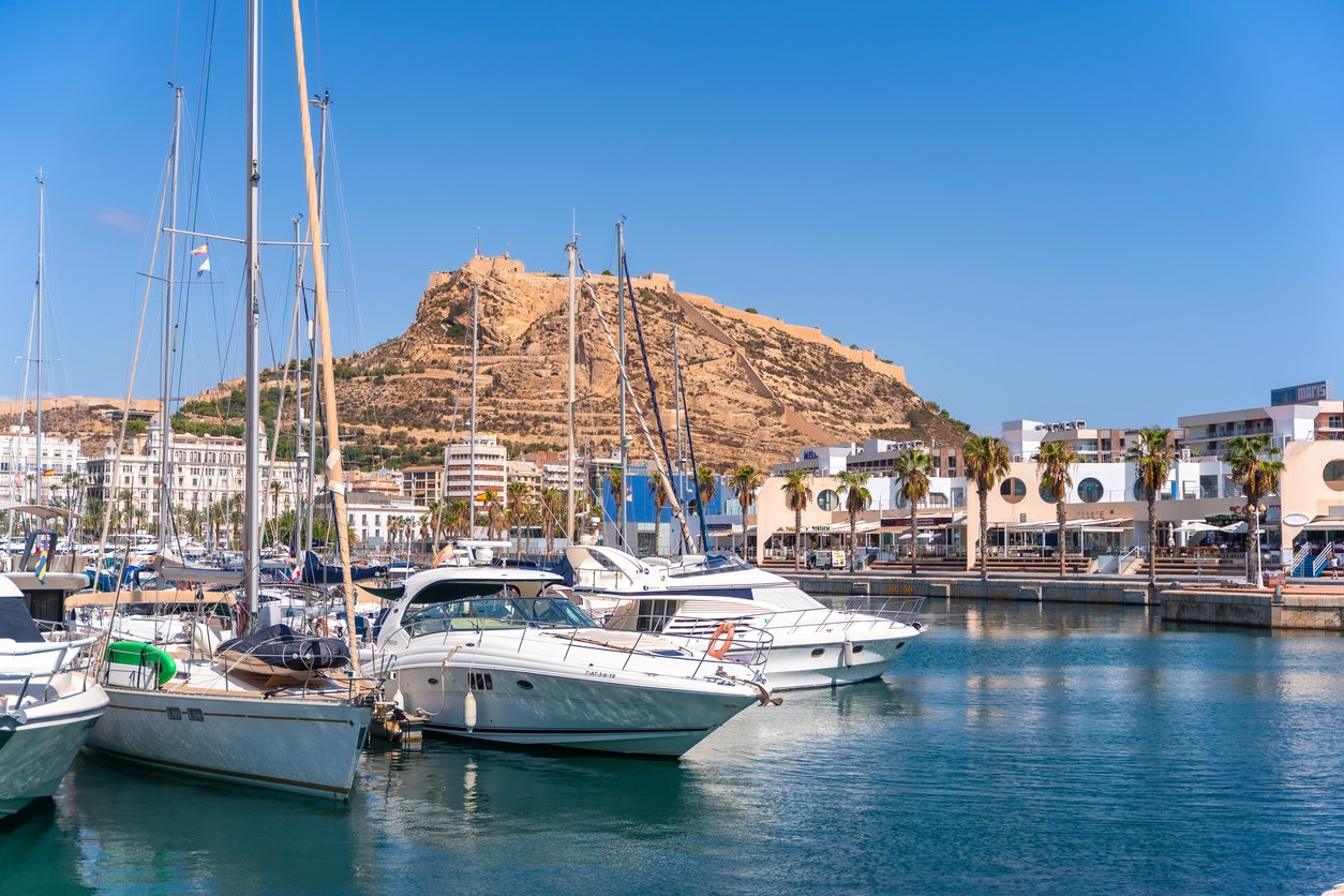 Alicante city port full of boats in summer