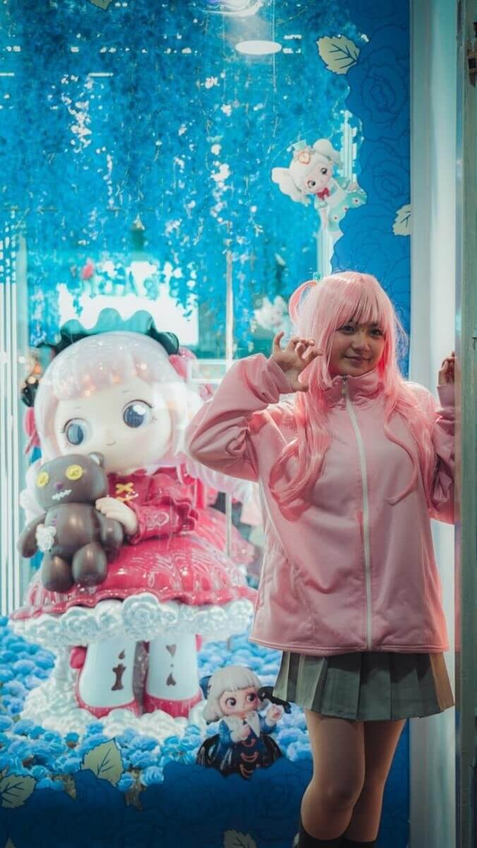 cosplay enthusiast in vibrant storefront setting