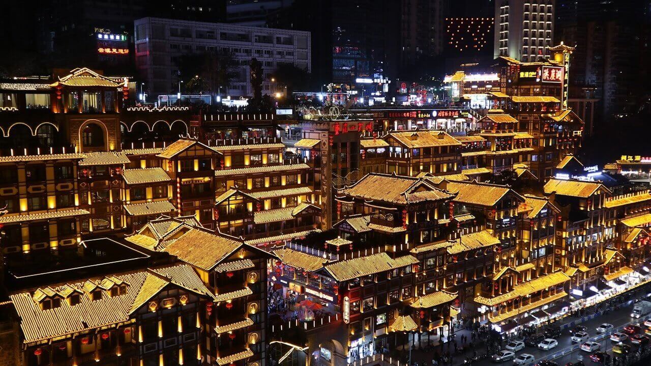 an aerial view of a city at night