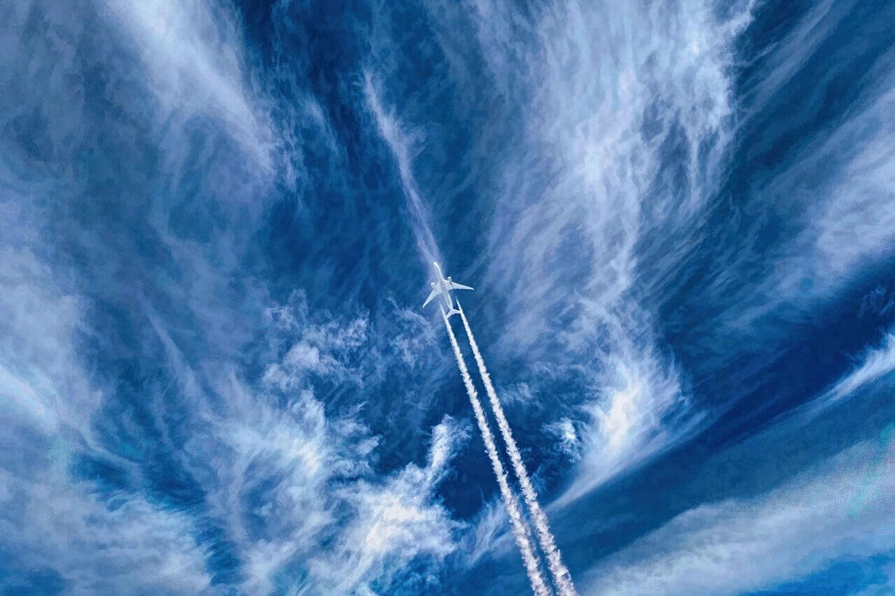 plane aircraft sky flight clouds 7432680