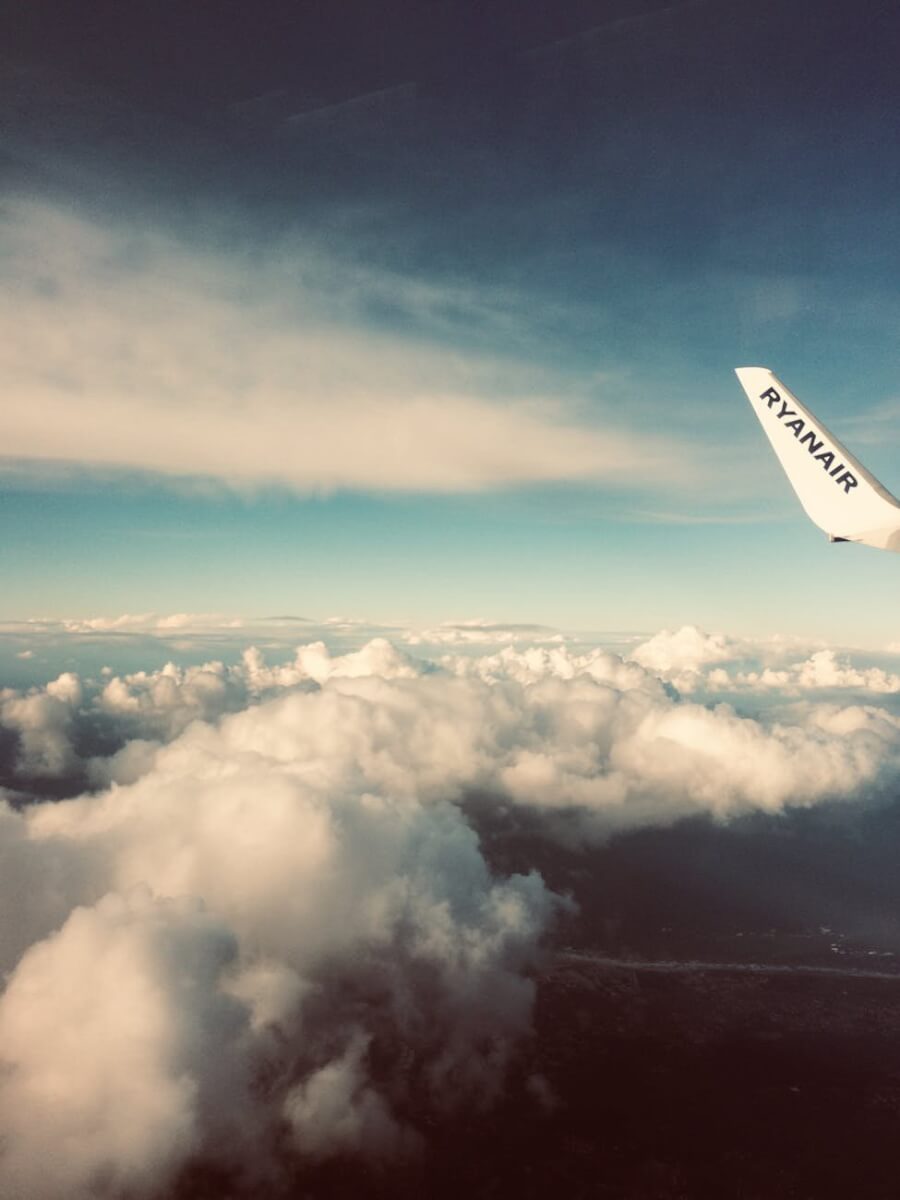 plane s tail near clouds